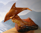 yellow cedar dolphin sculpture